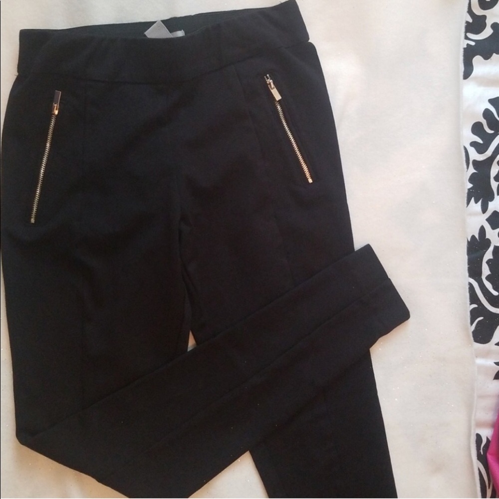 Black skinny pants with zippers